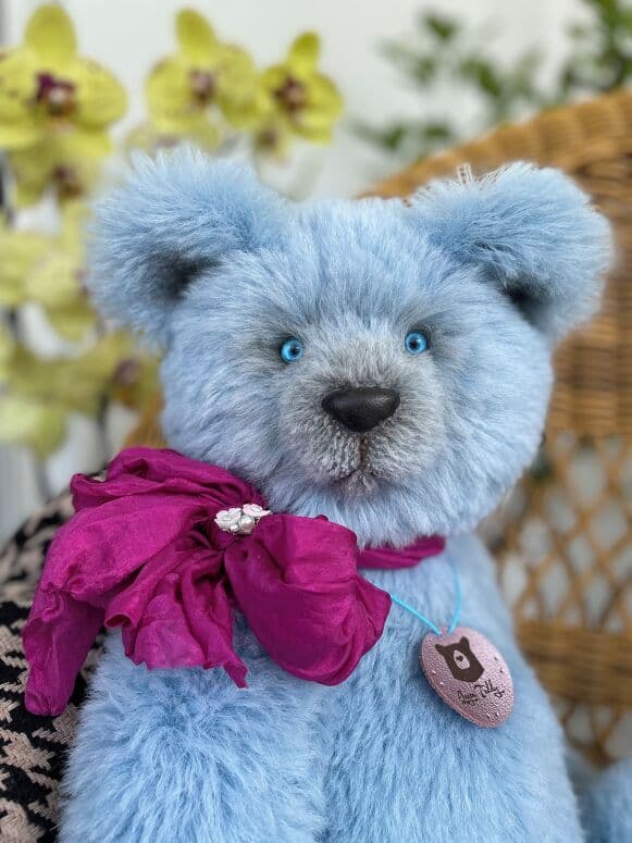 Close portrait of Shelalé with bright blue glass eyes