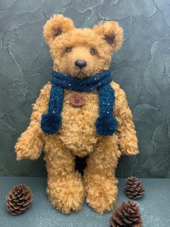 Sampaa, a golden mohair artist bear in a midnight-blue scarf, standing full length