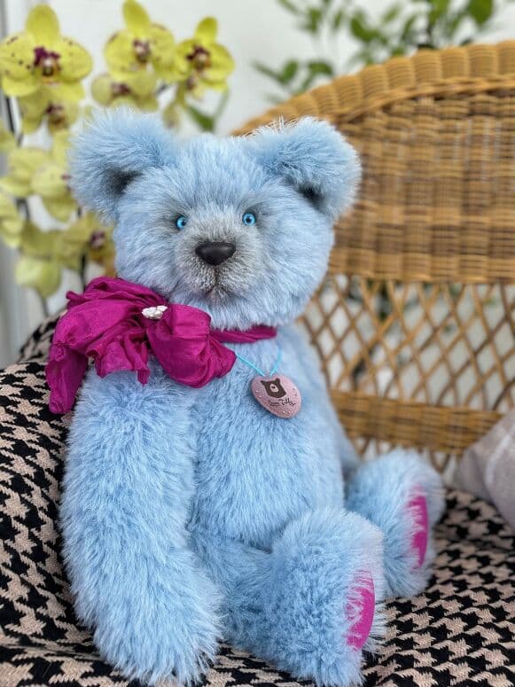 Shelalé, a waterfall-blue alpaca artist bear, seated full length