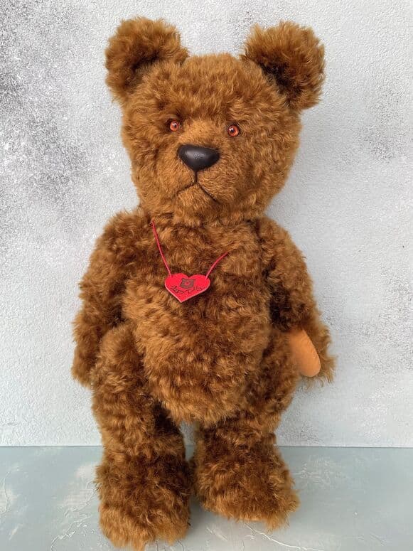 Adrian, a golden-brown mohair artist bear, standing full length