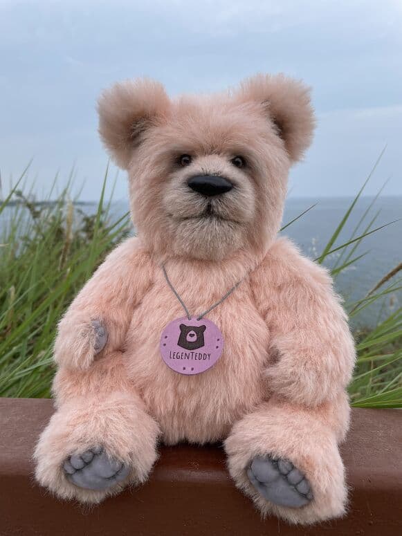 Mr. Marshall Mallow, a blush alpaca artist bear, seated full length