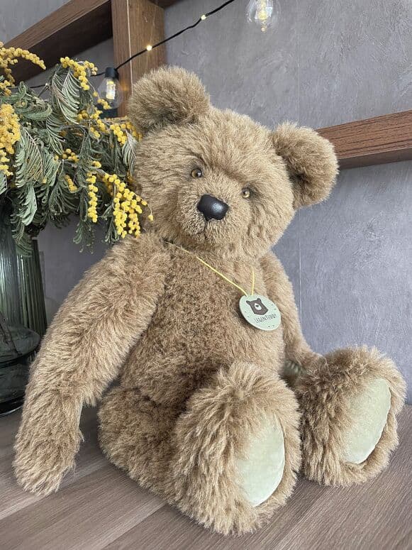 Oliver, a taupe alpaca artist bear, seated full length